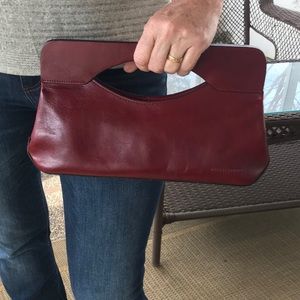 Wilson’s Leather Pelle Studio red handled clutch